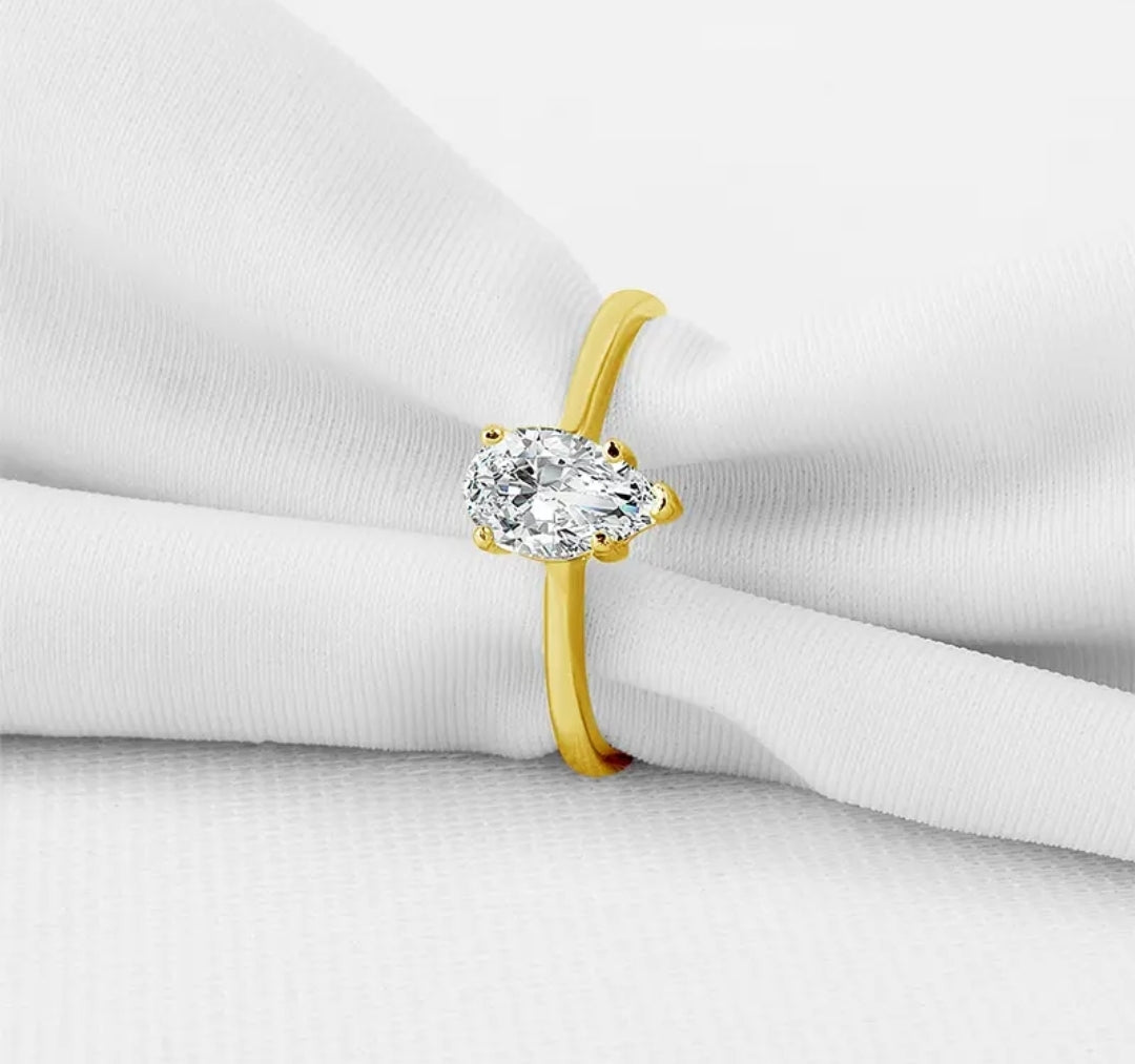 10k gold ring with 1ct pear cut moissanite