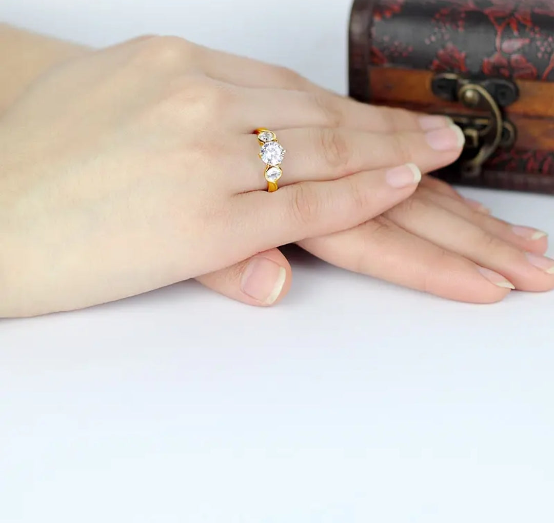 10k gold ring with 7mm 4mm 4mm brilliant moissanite