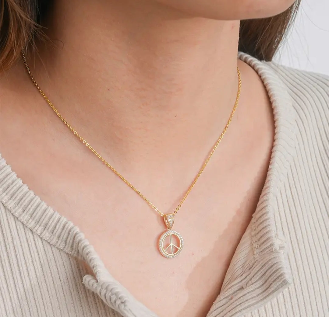 14k solid gold peace symbol necklace with 1.3mm zircons