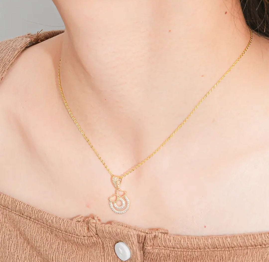14k solid gold double heart necklace with 1.3mm zircons