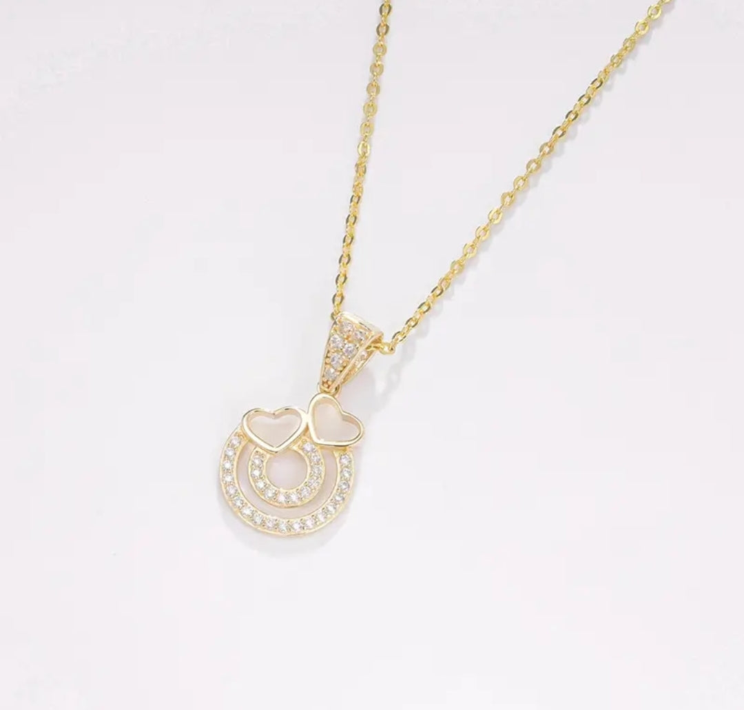 14k solid gold double heart necklace with 1.3mm zircons