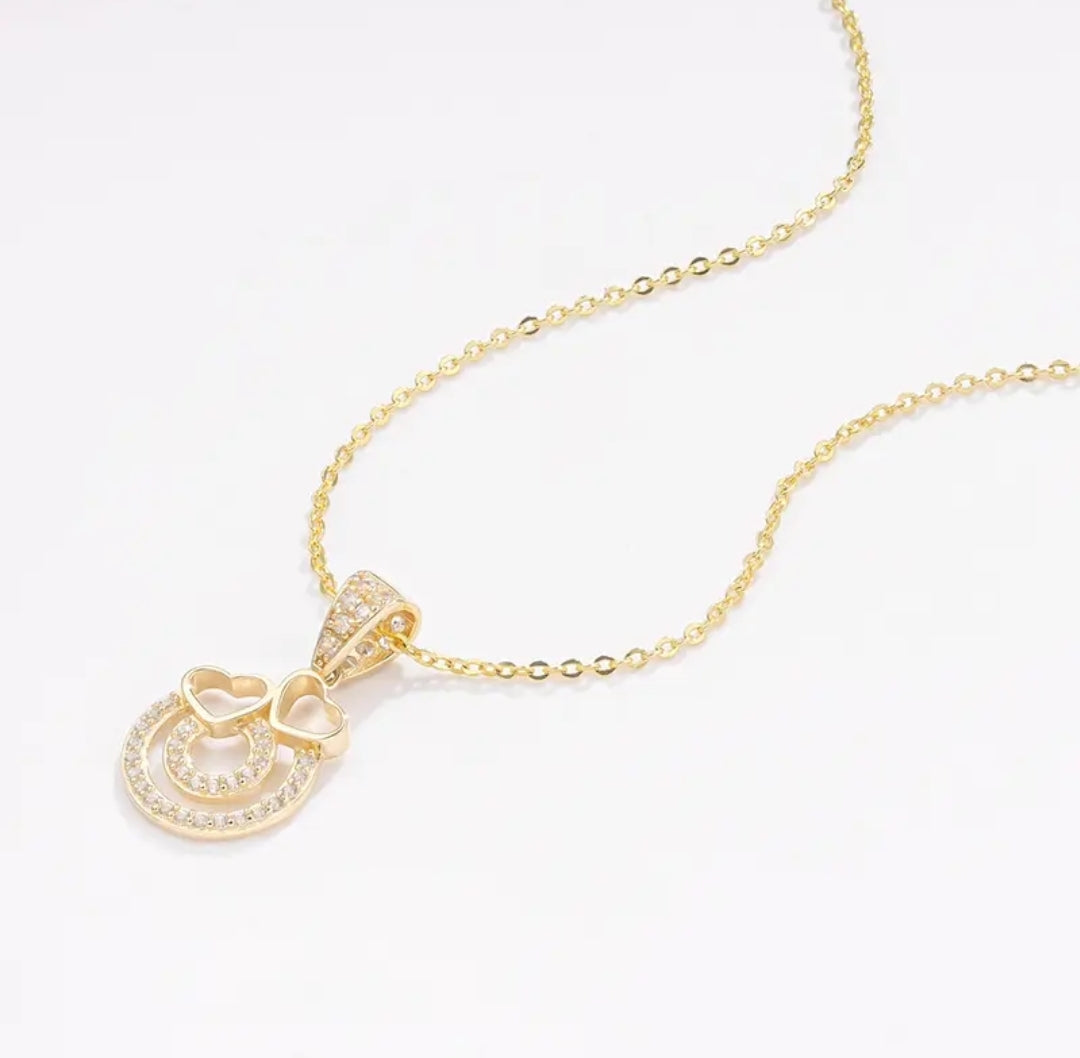 14k solid gold double heart necklace with 1.3mm zircons